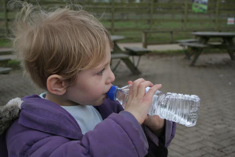 child drinking water bottle little girl drink healthy kid boy young nutrition outdoors outside beverage